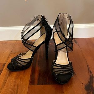 Black peep toe heels with rhinestone detail